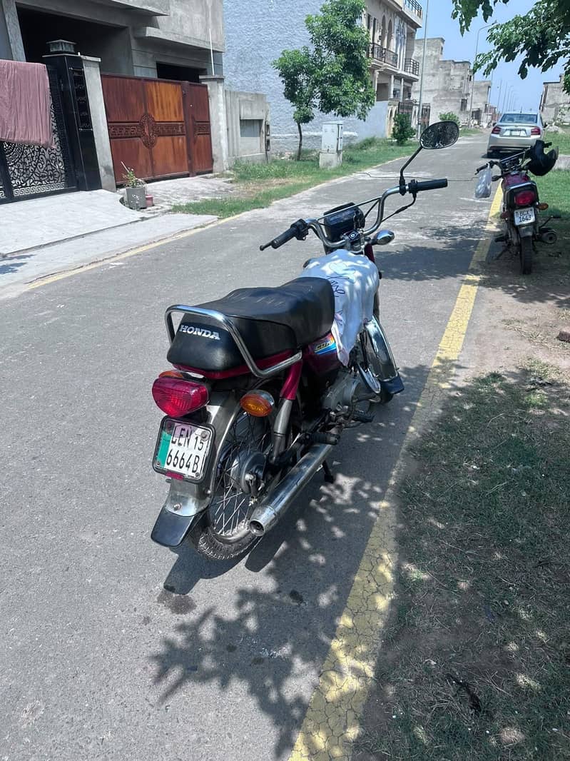 dhoom 70 cc 1