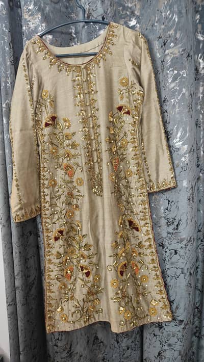 Hand word khaadi Net stitched 3 peice dress