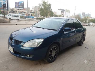 Mitsubishi Lancer 2005 auto complete docu expensive alloy family car