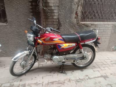 Honda CD70 one hand use
