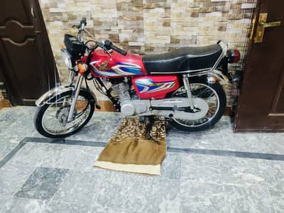 125 for sale 2022 model Islamabad registered