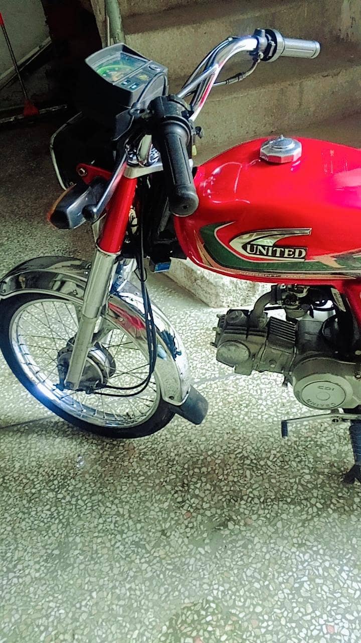 united 70cc 6