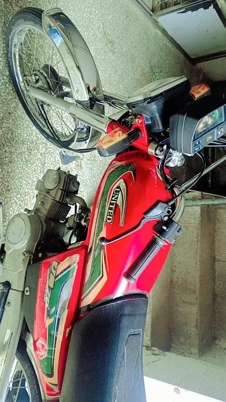 united 70cc 7