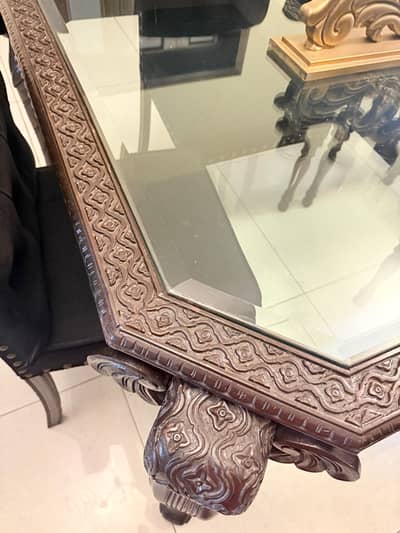 Pure Shesham wood dining table almost new from a designer shop