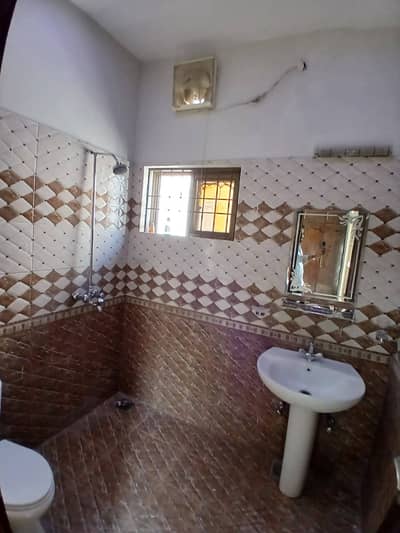 10 Marla Lower Portion with Powder Room Available for Rent in Public Health Society, Lahore