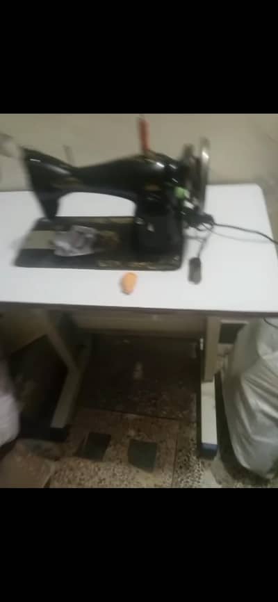 sewing machine with table
