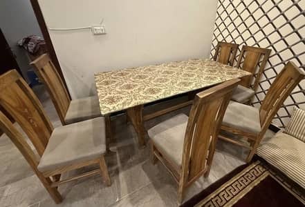 6 seater wooden dining table with heavy glass top