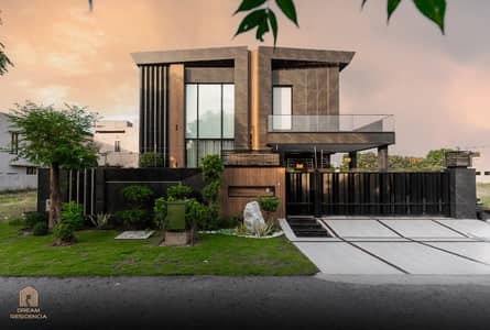 One Kanal Brand New Luxury Ultra-Modern Design Most Beautiful Fully Furnished Bungalow 2 Servant Quarter In Basement For Sale At Prime Location Of DHA Lahore Near To Park Masjid & Commercial Market.