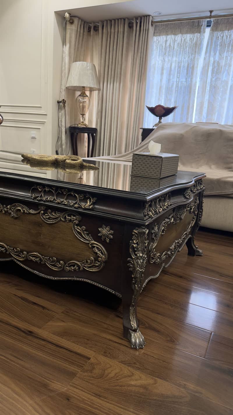 Solid wooden table with carving 1