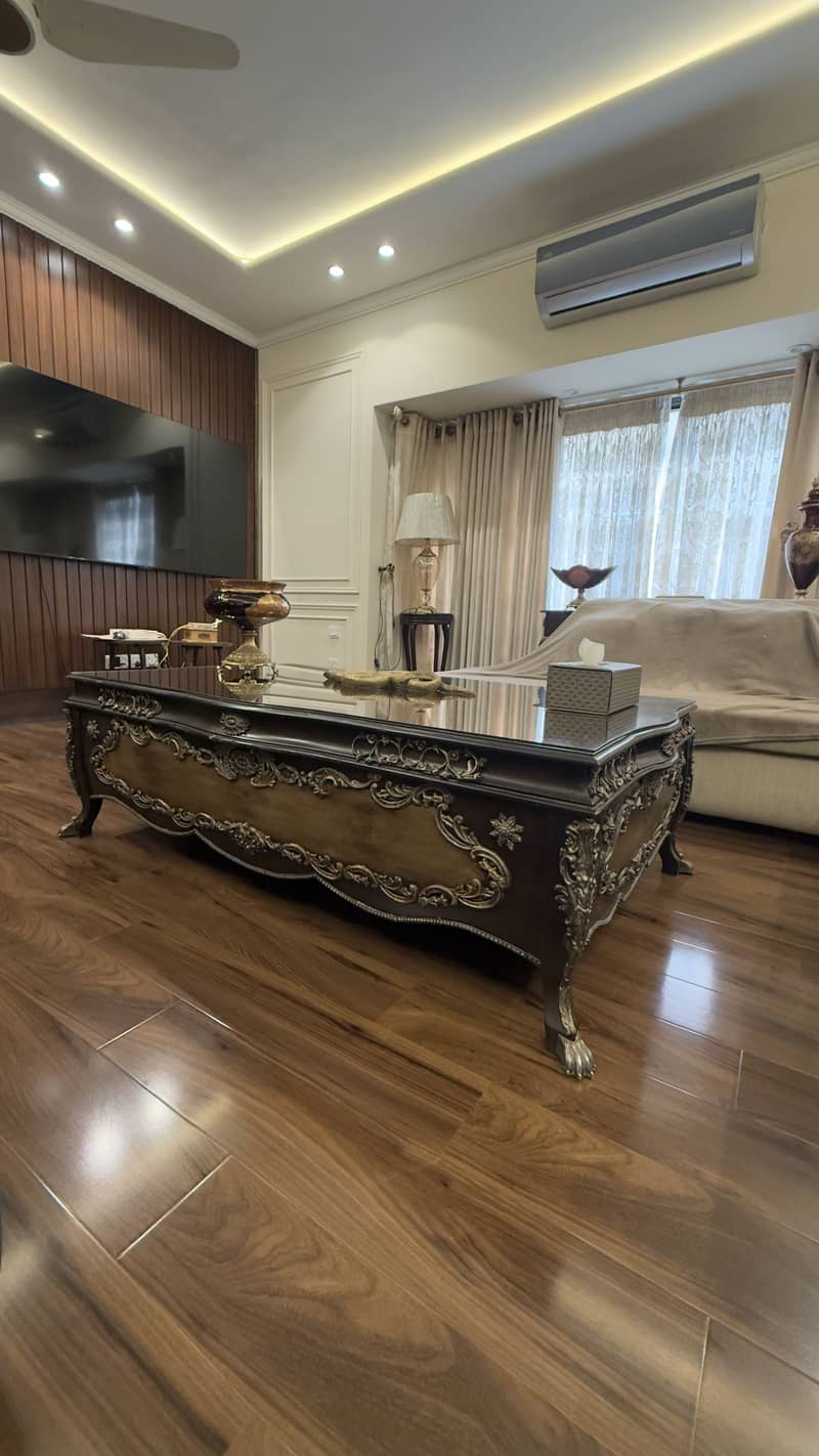 Solid wooden table with carving 3