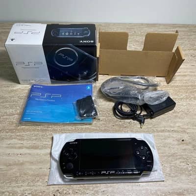 PSP 3000 with  128GB cards & original box & charger