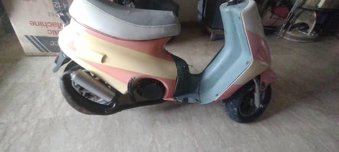 best scooty for kids 49. cc petrol engin pink and yellow kids favorite