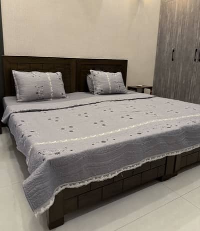 2 Wooden Single Beds