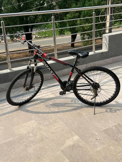 Mountain Bicycle with functional shocks and gears for sale.