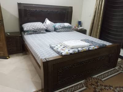 Double bed with side table and dressing