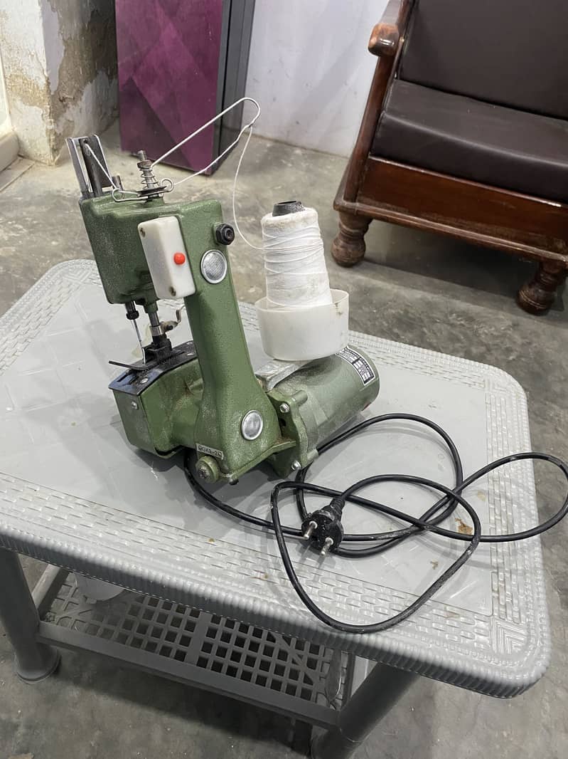 Bag closing machine 1