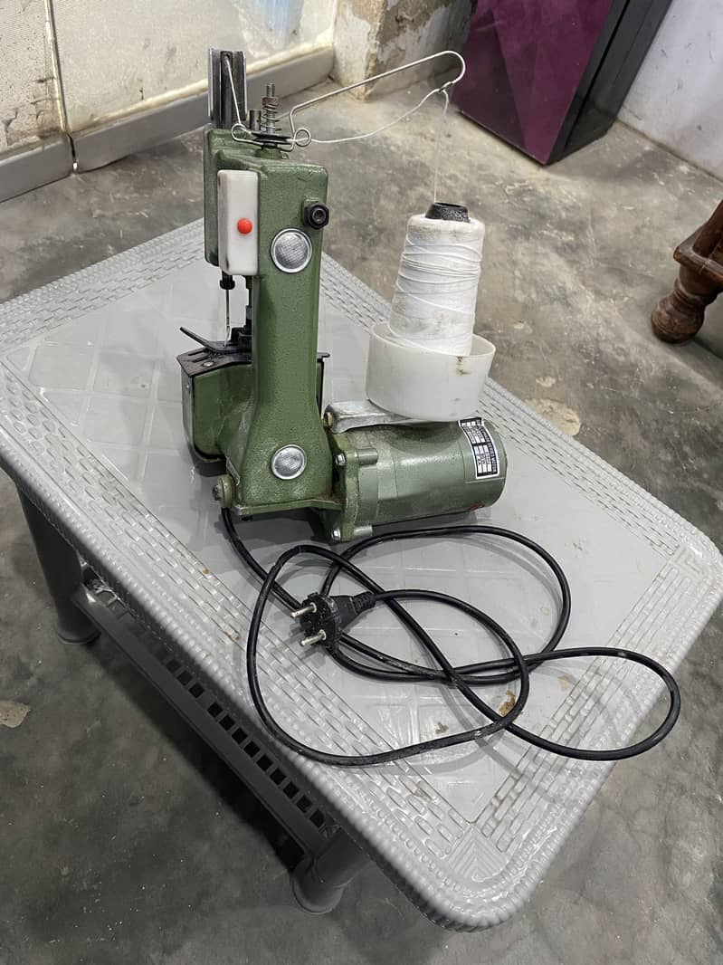 Bag closing machine 2