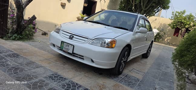 Honda Civic Oriel 2003 beige interior