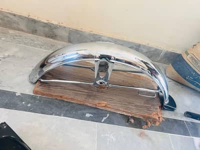 125 bracket and front motor guard in new condition for sale
