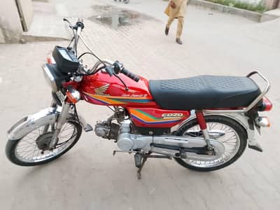 Honda CD 70 2011 model hai, original file aur copy ha