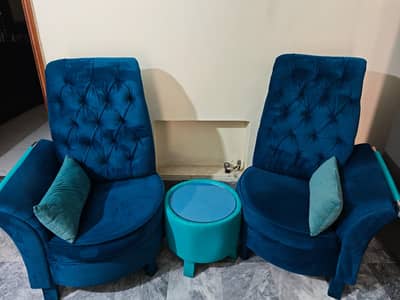 2 sofa chairs, with a round side table & new center table Urgent sale