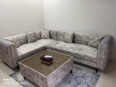 L shape sofa with 3 pouf / ottoman and center table