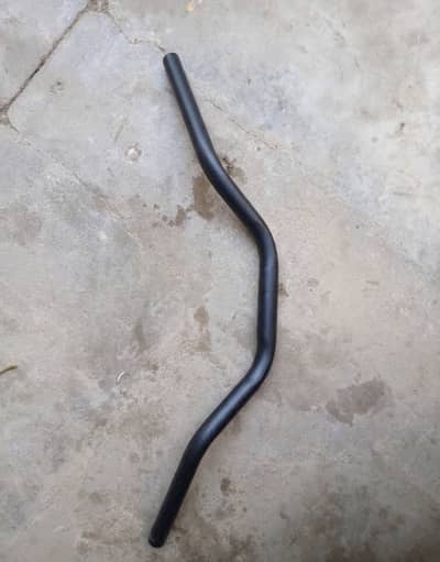Single piece cafe racer handle bar