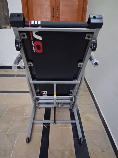 Treadmill autoimclined