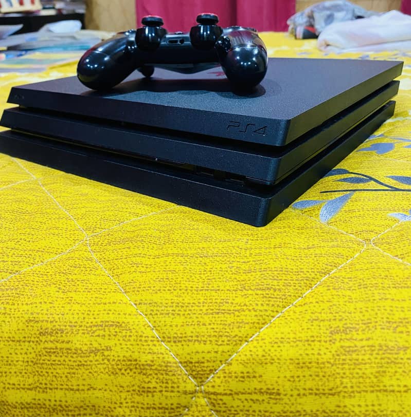 PS4 pro 1tb condition 10/10 without controller. 4