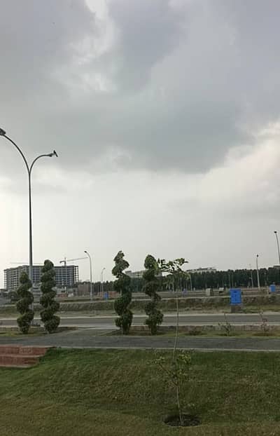 4 Marla Commercial Corner Plot Available for sale on Back of 150 feet road Main gate 1 Entrance.