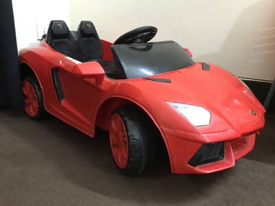 Kids battery car self + remove operated