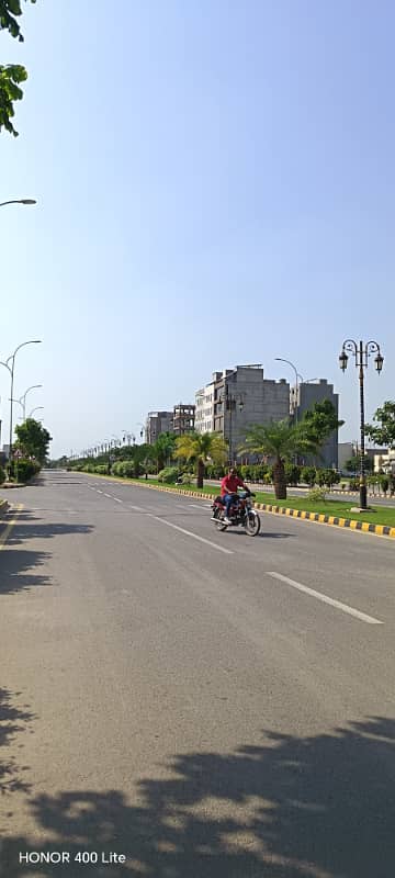 2 Marla Commercial shop available for sale in AL Jannat Housing Scheme.