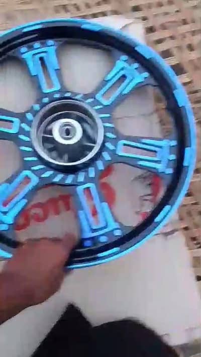 125 color alloy rims black or blue