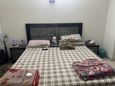 Black Bed with two side tables