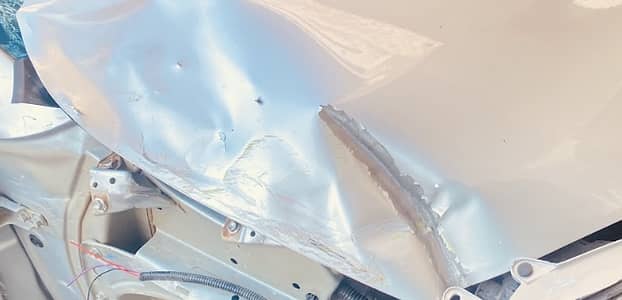 Suzuki alto Bonnet and Driver Genine side Door Slightely Damaged