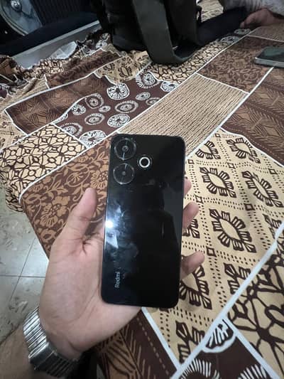 Xiaomi Redmi 13.     (fixed price 26k)