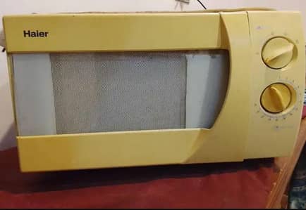 Haier Microwave oven in good condition working properly.