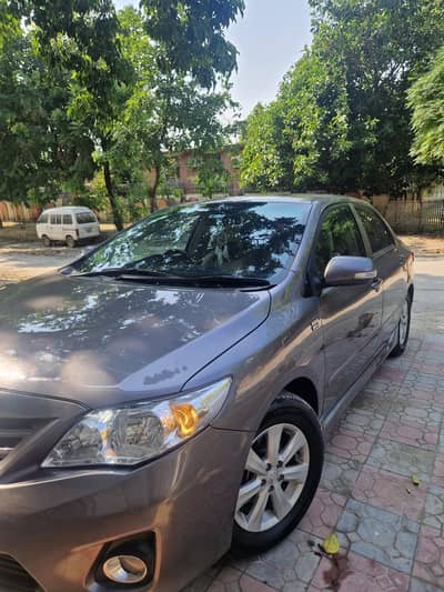 Toyota Corolla Altis SR 1.6 – Full Option 2014 Model Islamabad Num