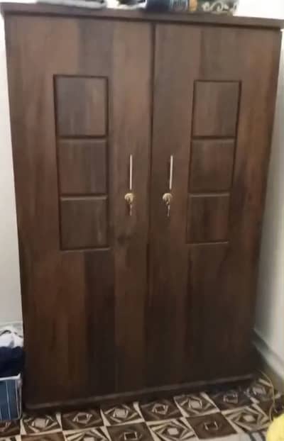 Bed and cupboard