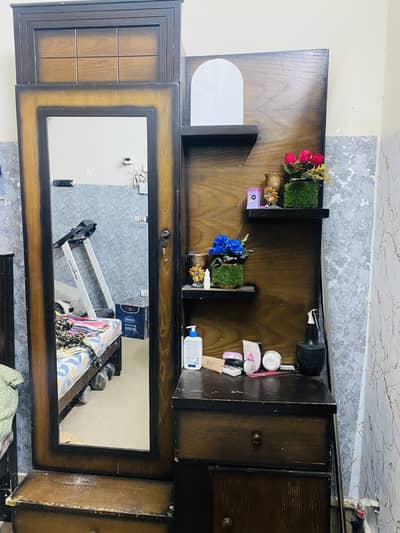 king size bed with side table and dressing