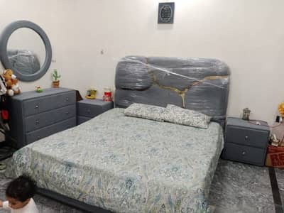 Bed and dressing with side tables