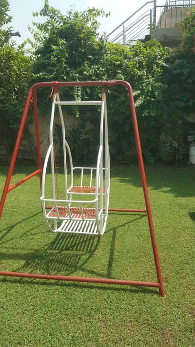 kids slides, swings and seesaw