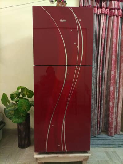Haier glass door like new refrigerator