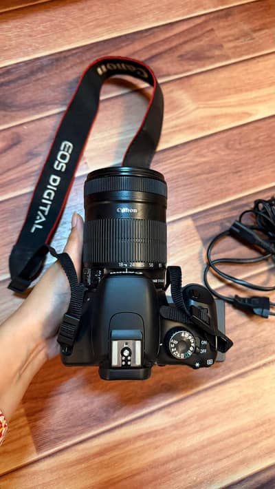 Canon EOS Kiss x4 with EF-S 18-135 mm. 69 mm lens.