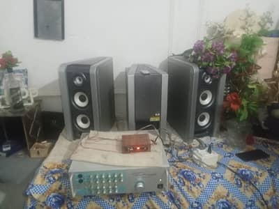 Sony ke speakers ha or Jarguar Suhyoung ka mixer ha full home theater