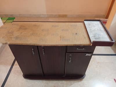 Slightly used iron stand with cabinet & storage up for sale