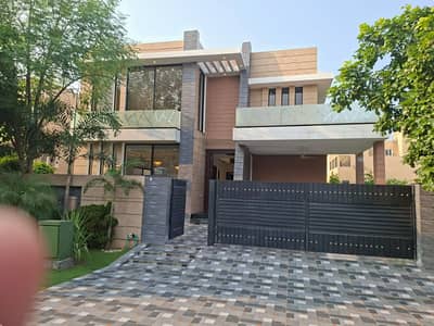 SYED BROTHERS PROUDLY OFFERS: 1-Kanal Elegant And Fully Maintained Modern Design Bungalow Near Raya Is Available In The Best Block Of DHA Lahore.