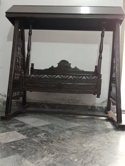 Customized wooden jhula.