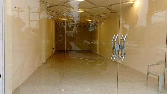 Shop for rent in Johar town main road Main Chok very rushi area good location best for pharmacy and ice cream setup