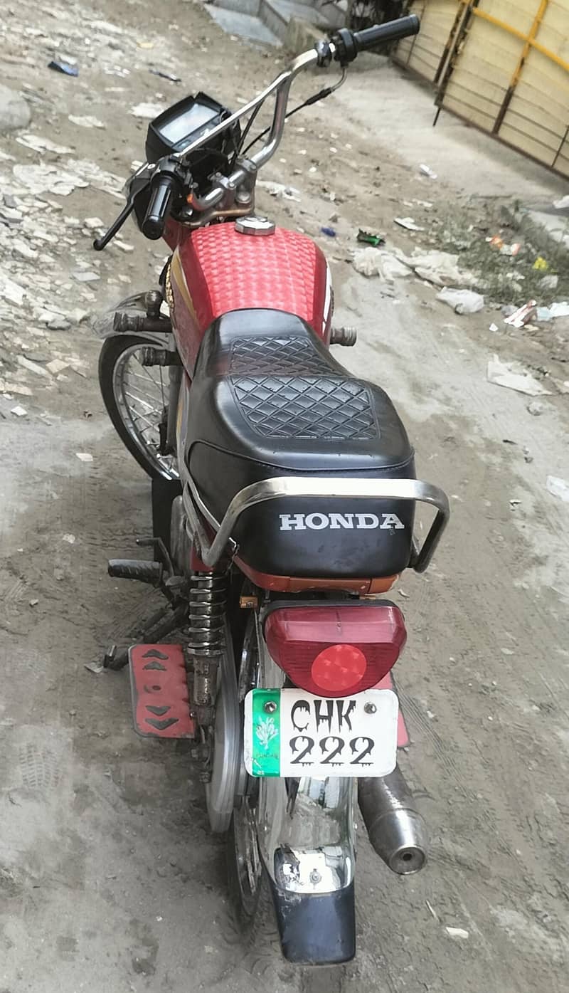 Dhoom-CD70 1